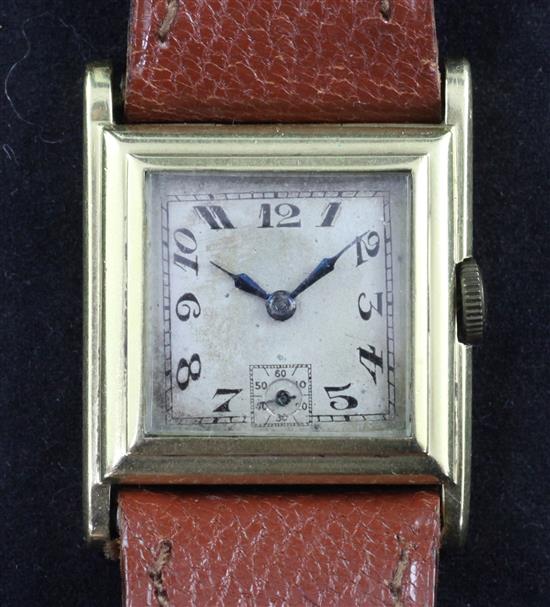 A gentlemans late 1920s 18ct gold manual wind wristwatch,